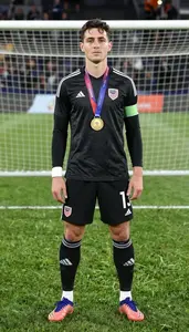 Soccer Defender Wearing Cleats Standing With Pride Presented