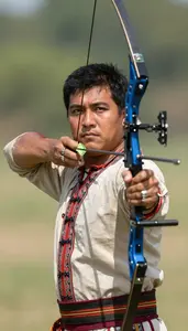 Traditional Archer In Ethnic Costume And Thumb Ring