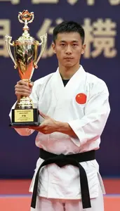 Wushu Wing Chun Practitioner Wearing Uniform Displaying