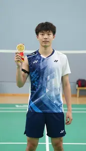 Badminton Aggressor Wearing Shorts Standing Triumphantly