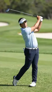 Golf Golfer Wearing Golf Visor Concentrated Chipping