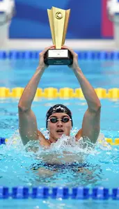Swimming Backstroke Swimmer Wearing Hand Paddles Displaying