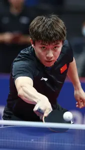 Table Tennis Loop Player Wearing Arm Sleeve Focused Looping