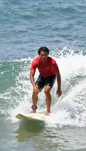 Male Professional Surfer Stock Photo