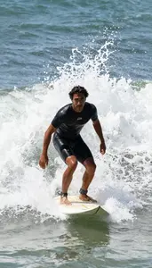 Male Professional Surfer Stock Photo