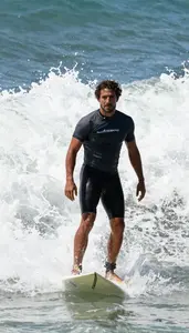 Male Professional Surfer Portrait Stock Photo