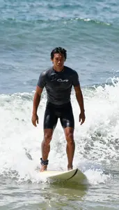 Male Professional Surfer Stock Photo
