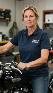 Female Motorcycle Repairer Portrait Stock Photo