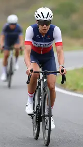 Female Professional Bicycle Racer Portrait Stock Photo