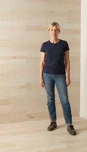Female Wood Tile Installer Stock Photo