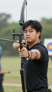 Archery Compound Archer Wearing Finger Tab Concentrated