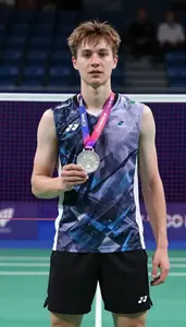 Badminton Doubles Player Wearing Shorts Displaying Presented