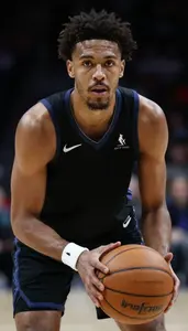 Basketball Power Forward Wearing Wristband Focused Passing