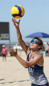 Beach Volleyball Spiker Wearing Top Focused Defending