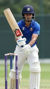 Cricket Batsman Without Helmet Wearing Arm Guard Alert