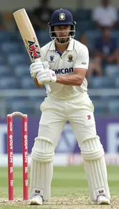 Cricket Opening Batter Wearing Cricket Jersey Concentrated