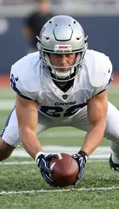 Football Linebacker Wearing Gloves Alert Tackling Screen