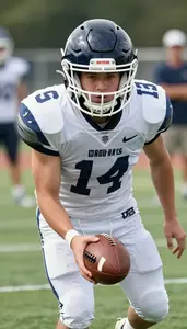 Football Running Back Wearing Shoulder Pads Alert Tackling
