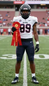 Football Running Back Wearing Football Cleats Standing Tall