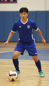 Futsal Defender Wearing Shorts Dynamic Defending Quick Pass