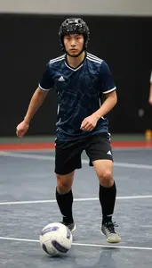 Futsal Utility Player Wearing Shorts Agile Pivoting Quick