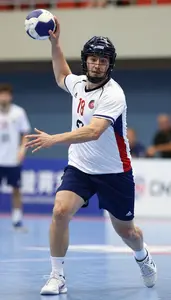 Handball Left Back Wearing Shorts Quick Feinting Bounce Pass
