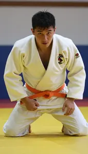 Judo Heavy Judoka Wearing Orange Belt Focused Blocking Hip