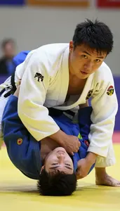 Judo Judoka Wearing Gi Powerful Pinning Chokehold In Ground