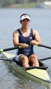 Rowing Coxswain Wearing Rowing Shorts Focused Stroking Blade