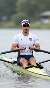 Rowing Single Sculler Wearing Rowing Shirt Focused Rowing