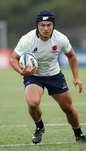 Rugby Sevens Center Wearing Rugby Shorts Focused Defending