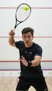 Squash Aggressive Player Wearing Wristband Intense Attacking