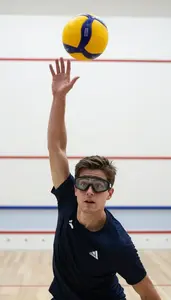 Squash All Court Player Wearing Goggles Powerful Volley Drop