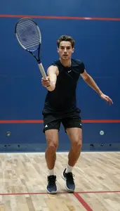 Squash All Court Player Wearing Shorts Intense Defending