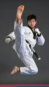Taekwondo Heavy Athlete Wearing White Belt Explosive Jumping