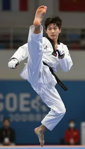 Taekwondo Light Athlete Wearing White Belt Quick Jumping