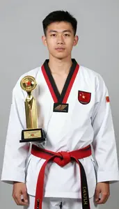 Taekwondo Taekwondo Athlete Wearing Red Belt Showcasing