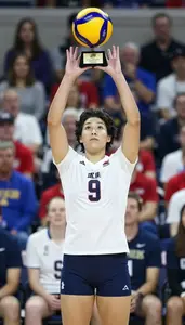 Volleyball Setter Wearing Shorts Displaying Raising