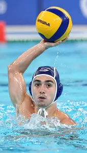 Water Polo Defender Wearing Earplugs Alert Treading Water