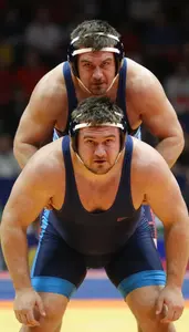 Wrestling Heavyweight Wearing Singlet Determined Escaping