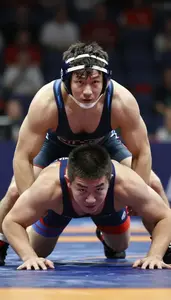 Wrestling Middleweight Wearing Singlet Determined Bridging