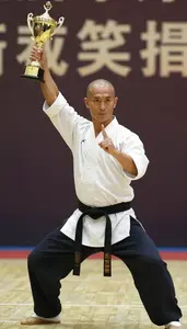 Wushu Wing Chun Practitioner Wearing Sash Standing Proudly