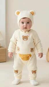 Baby Boy Super Hero Costume In A Soft Warm Cream Color With