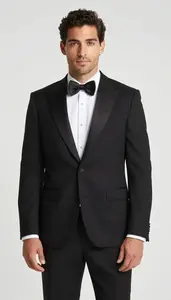 Man In Black Dinner Jacket With Bow Tie