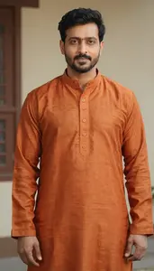Man In Rust Orange Kurta