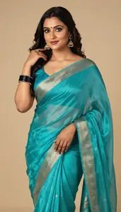 Woman In Aqua Silk Saree