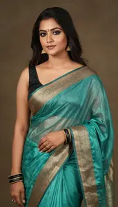Woman In Bottle Silk Saree With Border