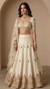 Woman In Butter Silk Lehenga