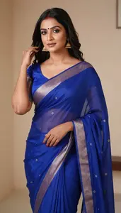 Woman In Cobalt Georgette Saree