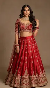 Woman In Crimson Silk Lehenga With Work